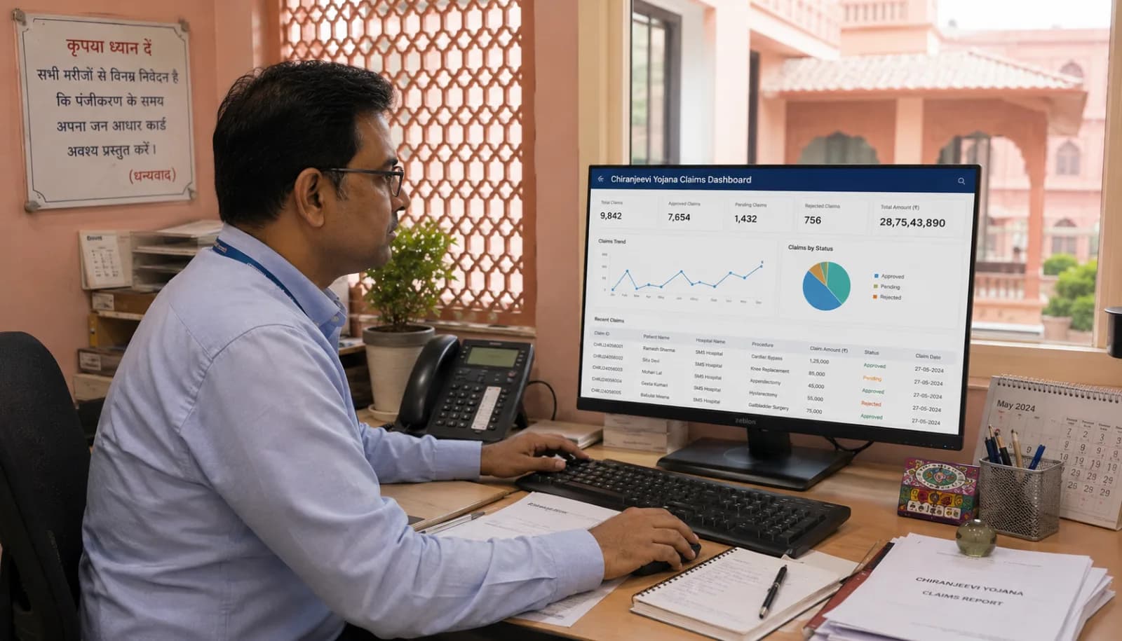 Rajasthan hospital administrator reviewing MAA Yojana (formerly Chiranjeevi) claims and RGHS portal documentation with ABDM compliance status on screen